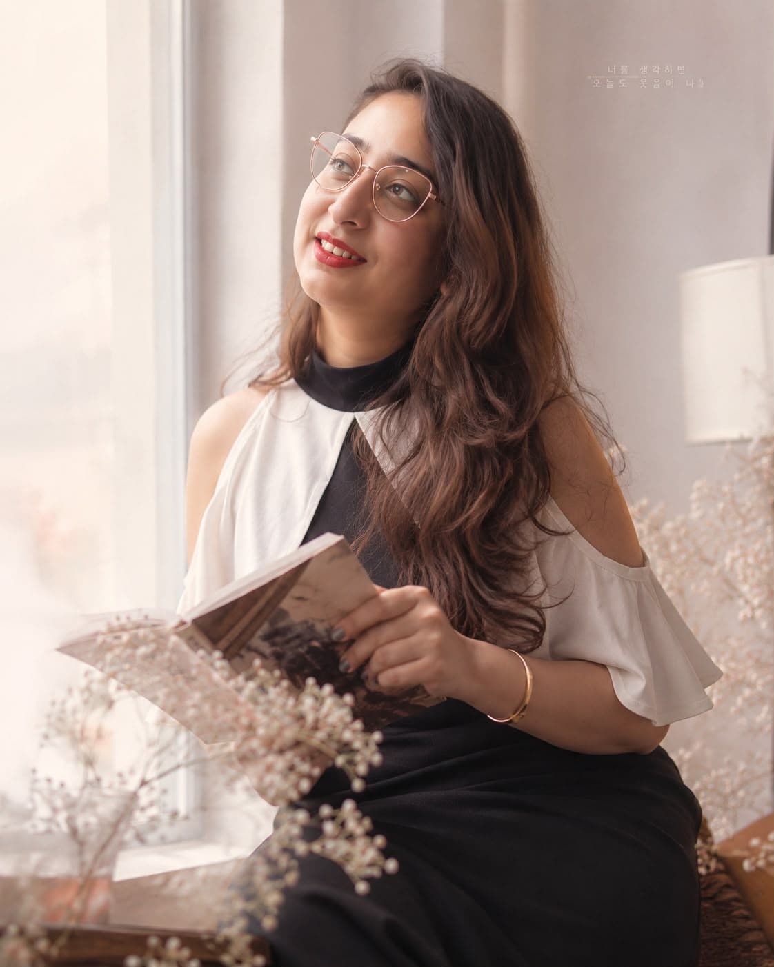 Rhythm Sharma holding a journal